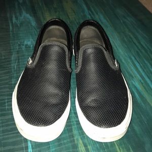Vans black leather slip ons
